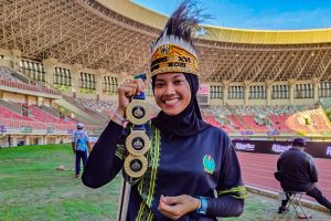 Nina Borong Tiga Medali Emas di Peparnas Papua